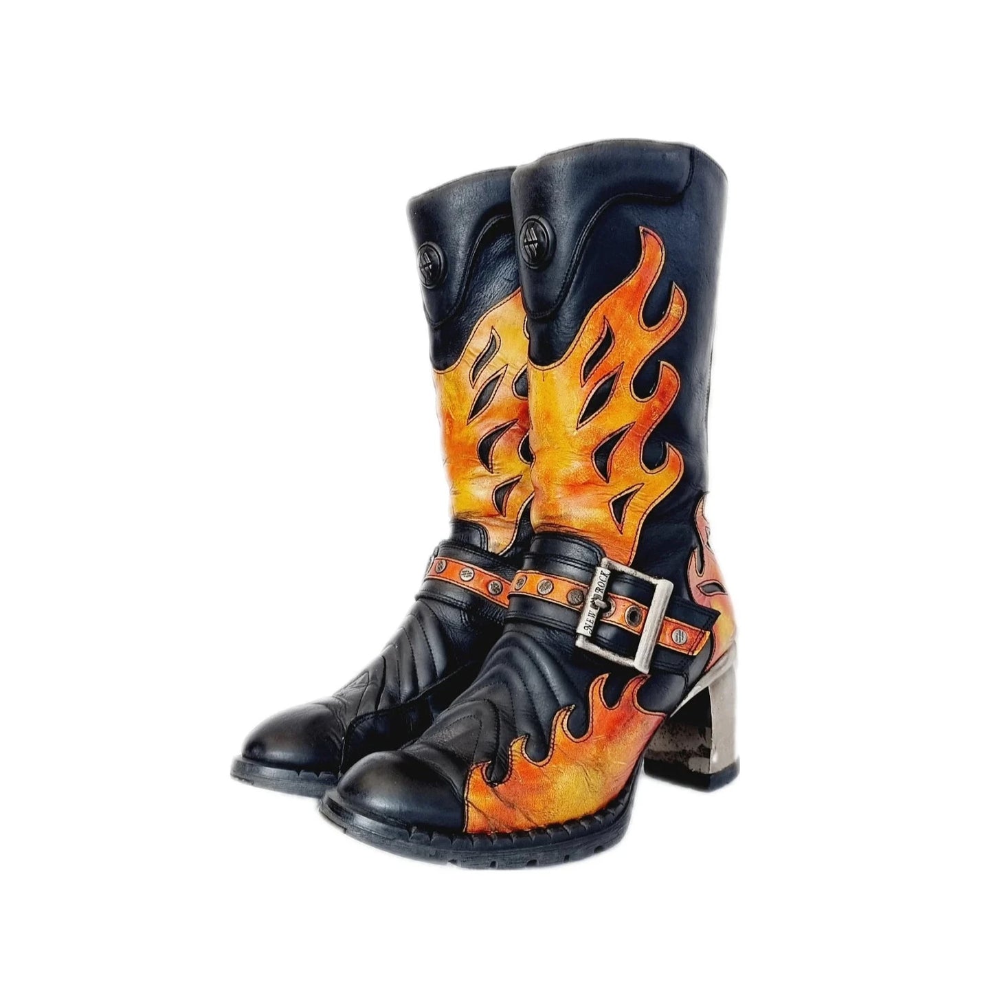 Rare leather New Rock boots with buckled front straps and inner zips. These tower boots are black, yellow orange and red in colour with flame designs across the front and back, and sit a little above the mid calf on chunky metal heels.