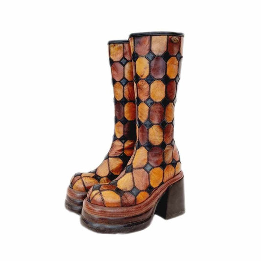 Rare vintage El Dantes heels with patchwork panels, rounded toes and quality embroidered detailing. Made with leather patchwork material and wooden stacked heels, these vintage chunky heeled boots sit as knee high boots.